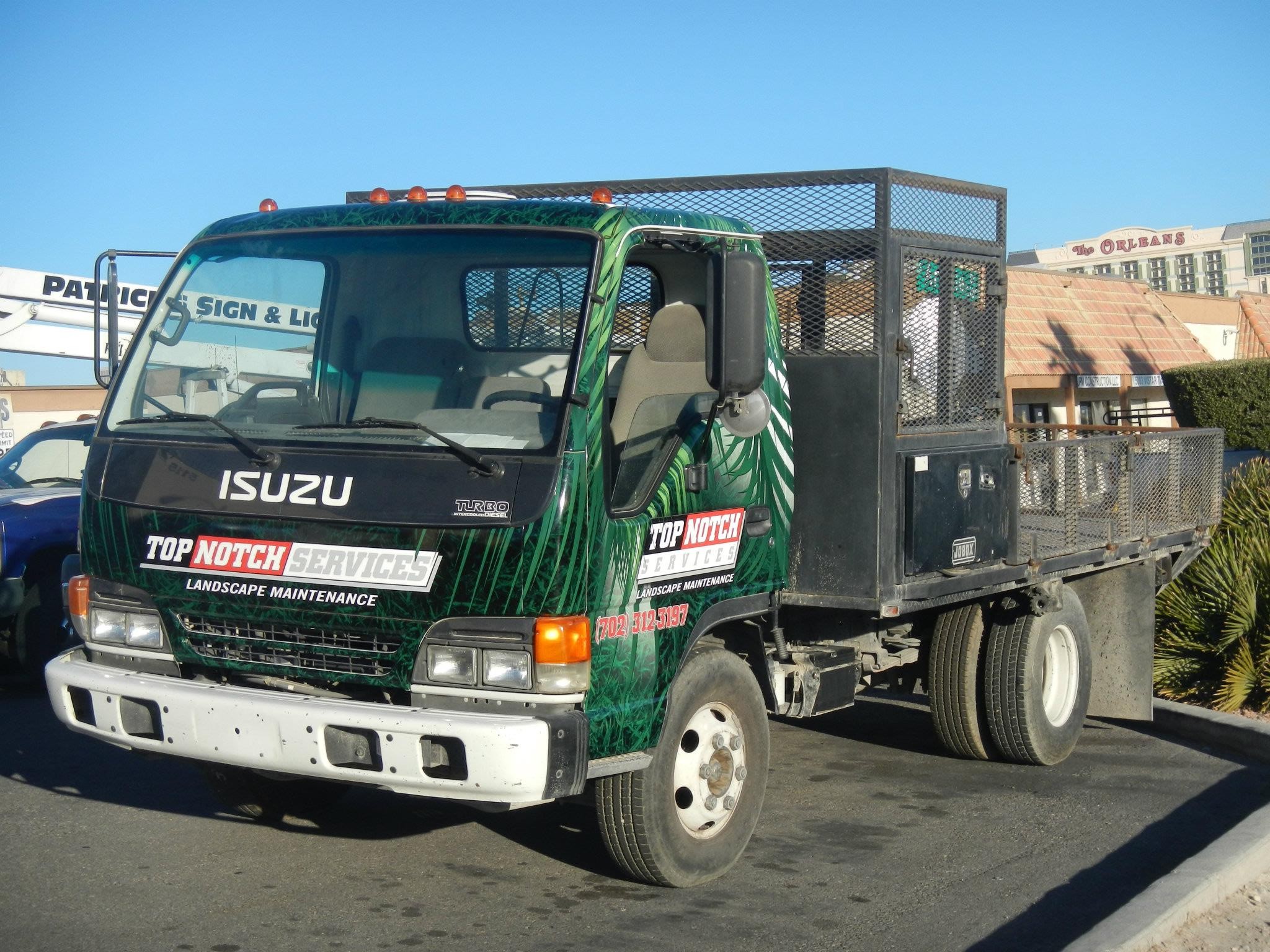 Top Notch Wrap 2 Patrick's Signs, Inc.